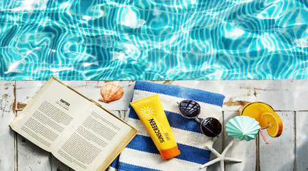 sunscreen sunglasses towel book recess relax concept1